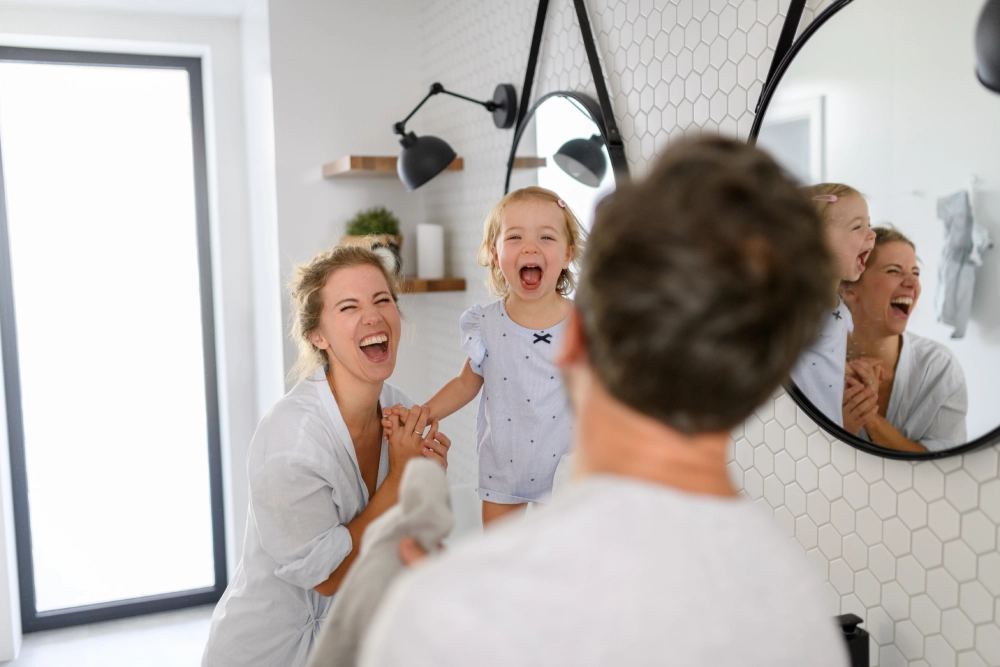 Happy family enjoying remodeled primary bathroom Northern Virginia